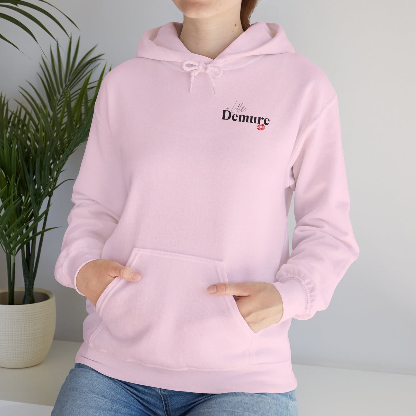 A Little Demure Unisex Heavy Blend™ Hooded Sweatshirt